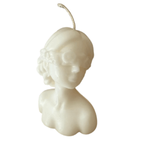candle in a shape of a girl